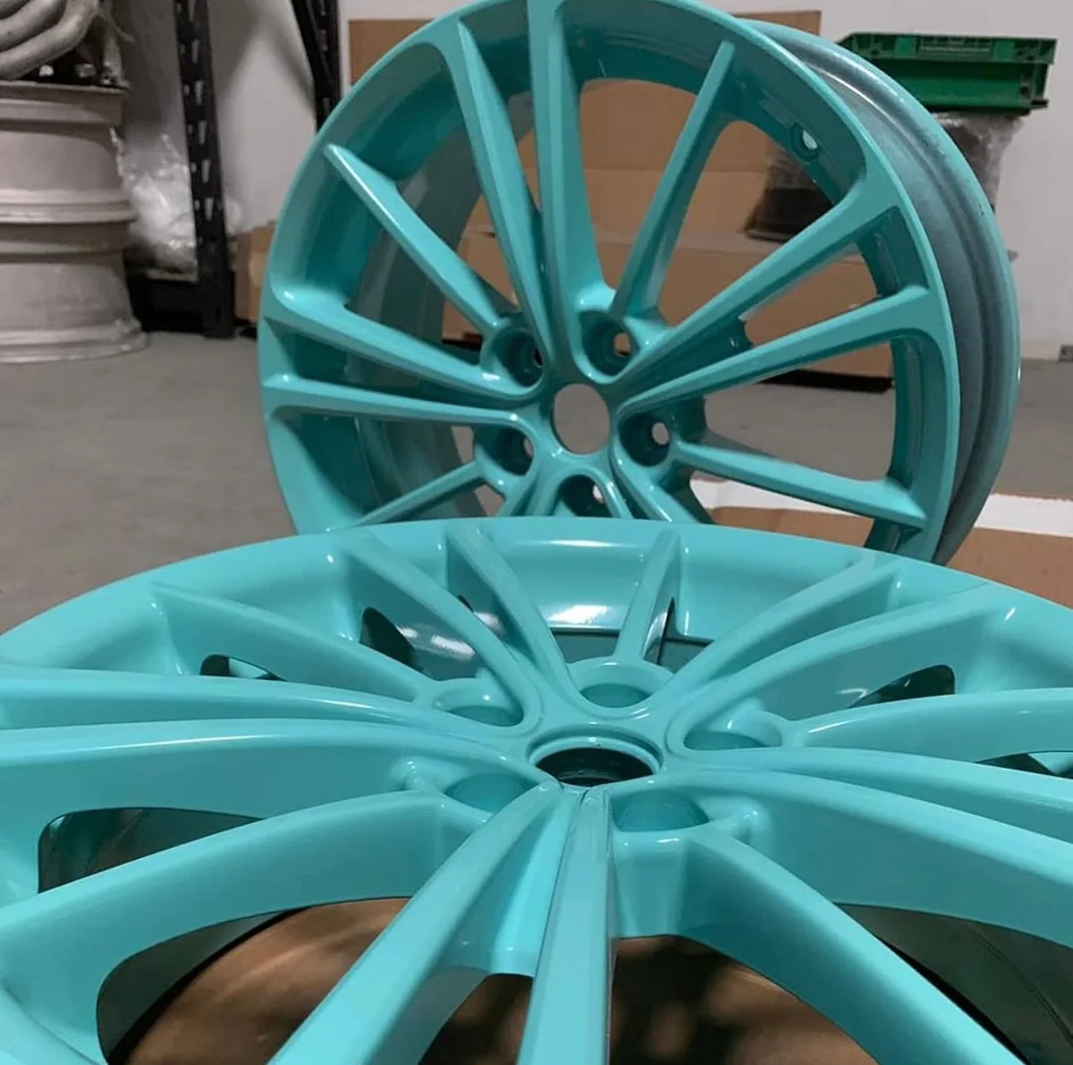 Turquoise blue wheels with a custom color finish